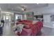 Open-concept living room showcasing wood floors and seamless flow to the kitchen and dining areas at 34 David Ln, Indianapolis, IN 46227