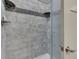 Modern shower with gray tiled walls, mosaic accents, and a glass door at 34 David Ln, Indianapolis, IN 46227