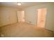 Spacious bedroom with carpet and multiple access doors at 3925 Oak Harbor Ln, Indianapolis, IN 46237