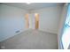 Bedroom featuring open doors to the hallway and closet at 3925 Oak Harbor Ln, Indianapolis, IN 46237