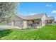 Attractive single-story home with brick and siding, complemented by a neat front yard and landscaping at 3925 Oak Harbor Ln, Indianapolis, IN 46237