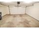Spacious garage with overhead door and ample storage capacity at 3925 Oak Harbor Ln, Indianapolis, IN 46237