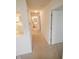 Long hallway leading to bathroom and kitchen at 3925 Oak Harbor Ln, Indianapolis, IN 46237