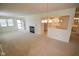 Open living room and kitchen area features a fireplace and dining area at 3925 Oak Harbor Ln, Indianapolis, IN 46237