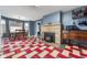 Open-concept dining area with fireplace and easy access to the kitchen at 453 S High School Rd, Indianapolis, IN 46241