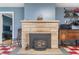 Close up of the dining area fireplace and mantle at 453 S High School Rd, Indianapolis, IN 46241