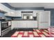 Bright kitchen featuring modern appliances, sleek countertops, and ample cabinet storage at 453 S High School Rd, Indianapolis, IN 46241