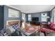 Comfortable living room with a fireplace and plenty of room to relax and unwind at 453 S High School Rd, Indianapolis, IN 46241