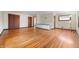 Bright living room features hardwood floors and large closet space for storage at 453 S High School Rd, Indianapolis, IN 46241