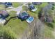 A bird's eye view of a residence with a well-maintained lawn and an in-ground pool at 4644 S Grassy Ct, New Palestine, IN 46163