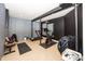 Basement workout area with exercise equipment and mirror at 4644 S Grassy Ct, New Palestine, IN 46163