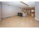 Open basement with a fireplace, neutral colors, and ample living space at 4644 S Grassy Ct, New Palestine, IN 46163