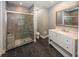 Modern bathroom with a tiled shower and vanity at 4644 S Grassy Ct, New Palestine, IN 46163