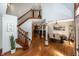 Open floor plan featuring stairs and dining room, great for entertaining guests at 4644 S Grassy Ct, New Palestine, IN 46163