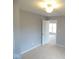 Comfortable bedroom is freshly painted and carpeted, ready for personalization and relaxation after a long day at 5523 Epperson Ct, Indianapolis, IN 46221