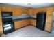 Functional kitchen features ample cabinet space, modern appliances, and a practical layout for cooking at 5523 Epperson Ct, Indianapolis, IN 46221