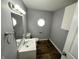Small bathroom with a mirror and sink at 5630 S Cladwell Dr, Pendleton, IN 46064