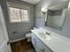 A bathroom featuring a sink and window at 5630 S Cladwell Dr, Pendleton, IN 46064