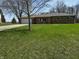 Charming brick ranch home with a large front yard and attached two-car garage at 5630 S Cladwell Dr, Pendleton, IN 46064