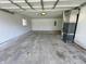 An empty garage with a furnace in the corner at 5630 S Cladwell Dr, Pendleton, IN 46064