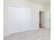 Bright bedroom with light-colored carpet, large closet, and ample natural light at 5653 Stetson Dr, Whitestown, IN 46052