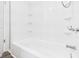 Bathroom featuring a clean bathtub and modern shower head at 612 Woodlawn Dr, Anderson, IN 46012