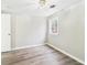 Bedroom featuring modern floors, neutral paint, and natural light at 612 Woodlawn Dr, Anderson, IN 46012
