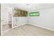 Laundry area with a utility sink, light colored flooring and functional design at 612 Woodlawn Dr, Anderson, IN 46012