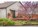 Charming home featuring a spacious wooden deck and beautiful landscaping at 6141 Madison Ave, Indianapolis, IN 46227