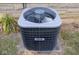 This outdoor AC unit is surrounded by some plants and is ready to keep you cool and comfortable all year at 6144 S Irwin St, Indianapolis, IN 46237