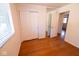 Bedroom with hardwood floors, closet and a window, providing ample light at 6144 S Irwin St, Indianapolis, IN 46237