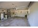 Spacious garage featuring ample storage, a water heater, and a laundry area at 6144 S Irwin St, Indianapolis, IN 46237