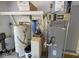 Image shows water heater, water softener, and furnace in the utility room at 6144 S Irwin St, Indianapolis, IN 46237
