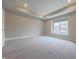 Spacious bedroom featuring neutral carpeting, recessed lighting, and a large window offering ample natural light at 6222 Fairview Dr, McCordsville, IN 46055