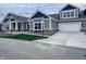 Beautiful home featuring a two-car garage and meticulously landscaped front yard at 6222 Fairview Dr, McCordsville, IN 46055