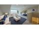 Upstairs living room with comfortable seating, a large window, and recessed lighting at 6222 Fairview Dr, McCordsville, IN 46055
