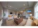 Open-concept living room featuring a coffered ceiling, recessed lighting, and neutral decor at 6222 Fairview Dr, McCordsville, IN 46055