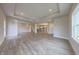 Spacious open-concept living area with hardwood floors and bright natural light at 6222 Fairview Dr, McCordsville, IN 46055
