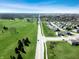 Community aerial view showcases homes, roads and green spaces offering a glimpse into the neighborhood's layout at 6767 Sonora Blvd, Brownsburg, IN 46112