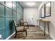 Stylish foyer featuring paneled wall, modern decor, wood floors, and ample natural light at 6767 Sonora Blvd, Brownsburg, IN 46112