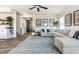 Spacious living room with a modern design, plush sectional, and an inviting atmosphere at 6767 Sonora Blvd, Brownsburg, IN 46112