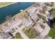 Beautiful aerial view of lakeside homes with docks, set against the blue water at 7454 Harbour Isle # 158, Indianapolis, IN 46240