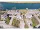 Stunning aerial view of waterfront community with manicured lawns and private docks at 7454 Harbour Isle # 158, Indianapolis, IN 46240