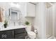 Bathroom featuring modern vanity, toilet, and walk in shower at 7454 Harbour Isle # 158, Indianapolis, IN 46240