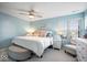 Calming bedroom with a large bed, neutral colors, and a window with natural light at 7454 Harbour Isle # 158, Indianapolis, IN 46240