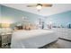 Bright bedroom with a king bed, neutral colors, and a window with natural light at 7454 Harbour Isle # 158, Indianapolis, IN 46240
