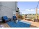 Beautiful deck with blue rug, outdoor furniture, wood burning fire pit and grill at 7454 Harbour Isle # 158, Indianapolis, IN 46240