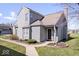 Inviting exterior showcasing the home's architectural details and landscaping at 7454 Harbour Isle # 158, Indianapolis, IN 46240