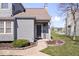 Charming home featuring a welcoming front entrance with a decorative wreath at 7454 Harbour Isle # 158, Indianapolis, IN 46240