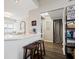 Bright kitchen view showing breakfast bar, hardwood floors and modern decor at 7454 Harbour Isle # 158, Indianapolis, IN 46240